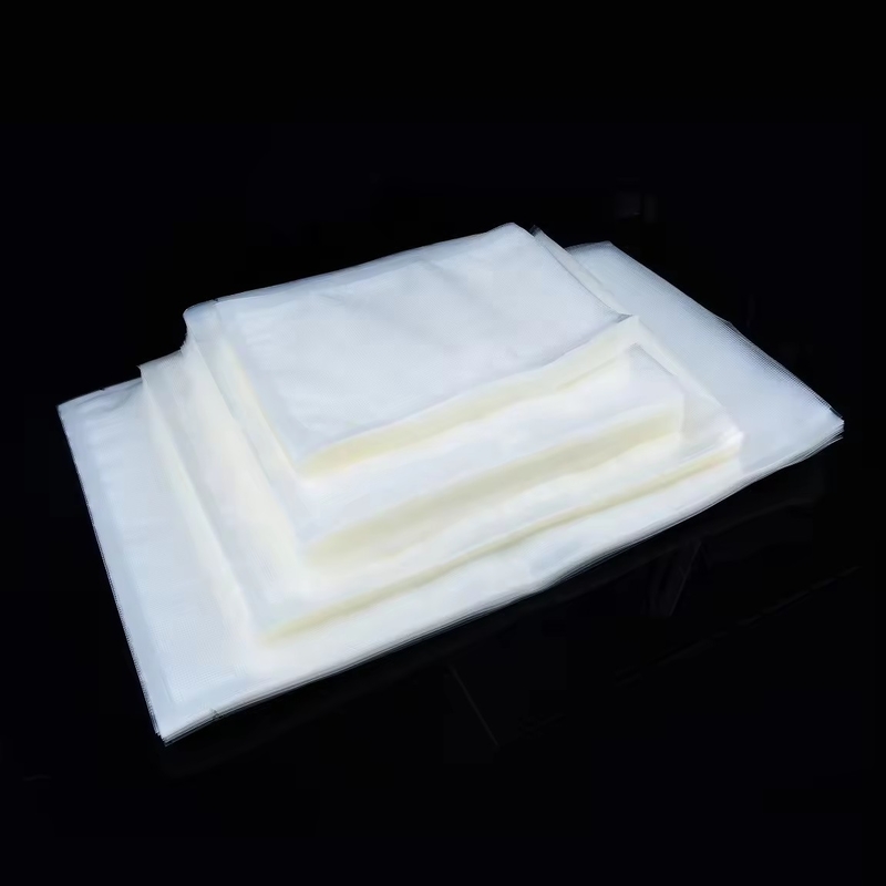 Sacos de vedação de vácuo transparente de trabalho pesado em relevo para poupança de alimentos Embalagens de plástico de nylon Saco de vedação de vácuo transparente grande