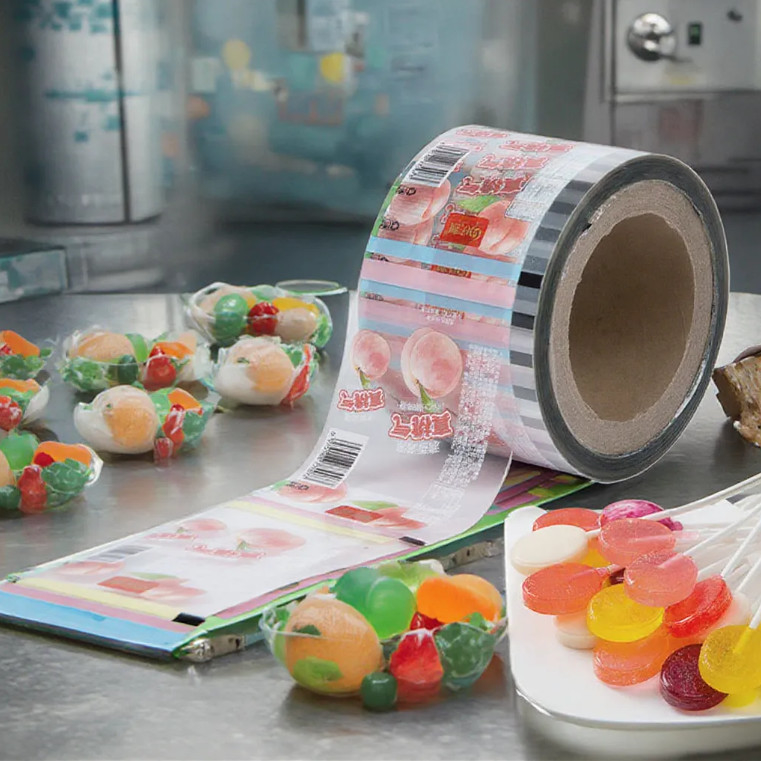 Impressão personalizada Saquete de embalagem Rolo de filme de grau alimentício Pe Bopp doces Lolipop Chocolate Alimentos de embalagem automática Rolo de filme